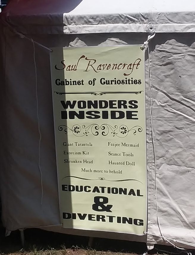Photo of Tent O' Wonders banner proclaiming "Wonders Inside" "Educational and Diverting"